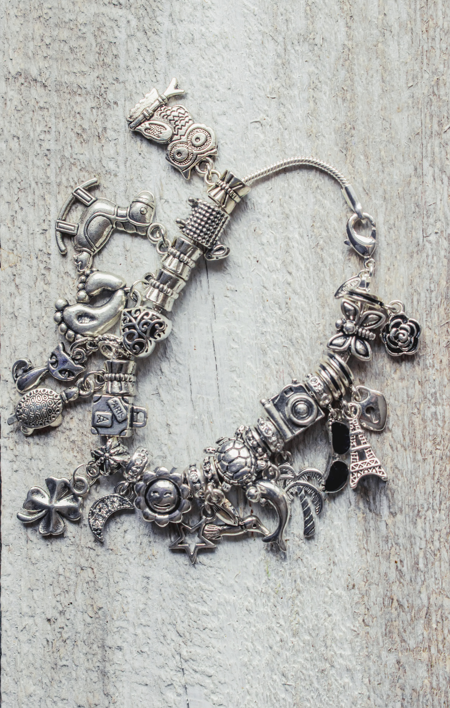 bracelet with charms. selective focus. Beauty and fashion.